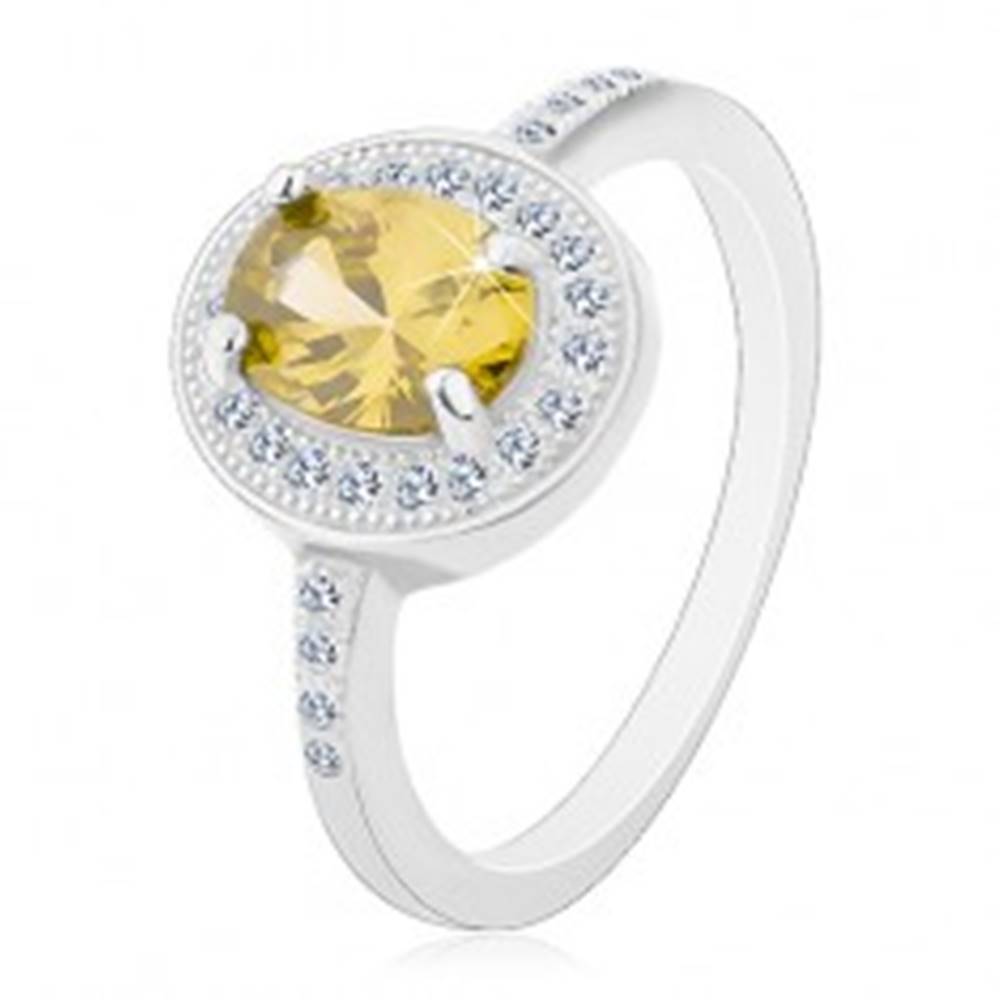 Šperky eshop Ródiovaný prsteň, striebro 925, oválny svetlozelený zirkón, číry zirkónový lem - Veľkosť: 49 mm